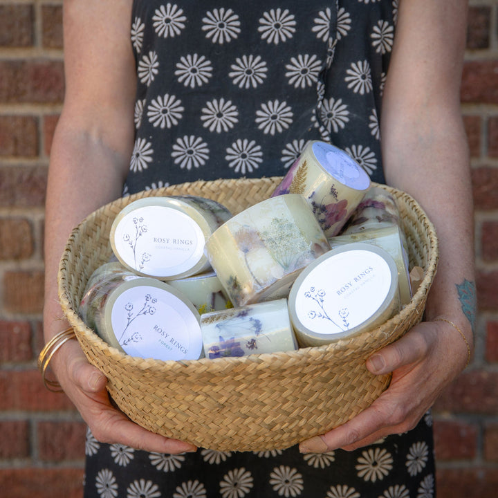 Basket filed with ROSY RINGS Petite Oval Candles